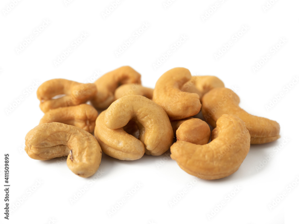 Tasty Roasted Cashew nuts isolated on white background. Natural fruit snack for healthy food concept. Tasty Roasted Cashew nuts isolated on white background. Natural fruit snack for healthy food concept.