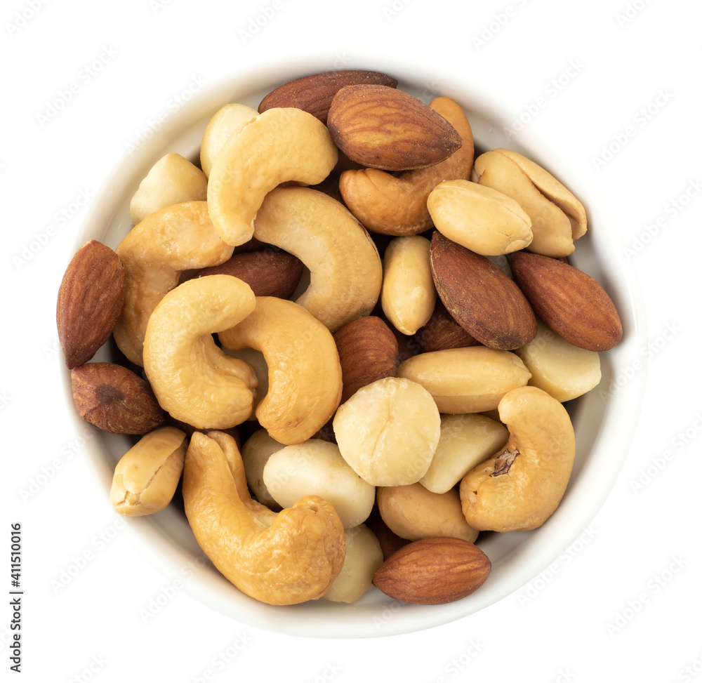 Nuts in top view circle shaped ceramic bowls isolated on white background. Various nuts (almonds, macadamia, cashew, peanuts). Mix nut healthy ingredients food. Nuts in top view circle shaped ceramic bowls isolated on white background. Various nuts (almonds, macadamia, cashew, peanuts). Mix nut healthy ingredients food.