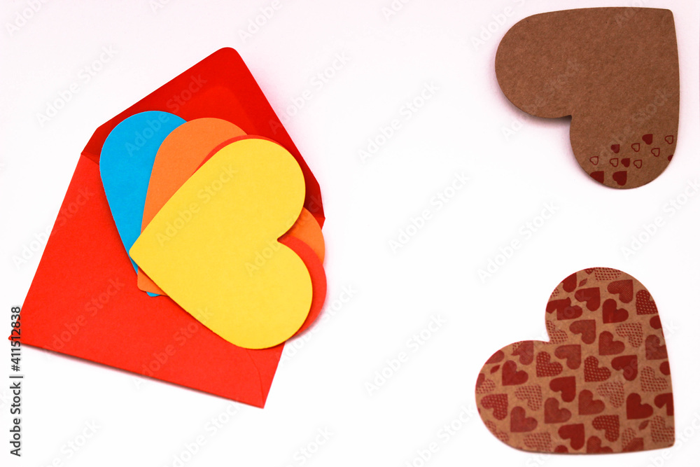 colorful heart shaped papers background for gay chat sites on colorful envelope, love message background, top view.
