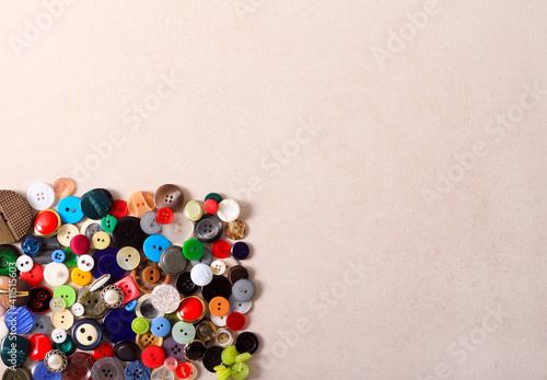 Different colorful clothes buttons