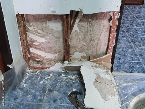 picture of damaged wall in the house because have been eaten by termite
