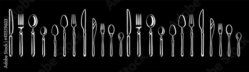A frame of forks, spoons, knives, and cutlery. Banner design for a cook. Illustration in chalk on a blackboard.