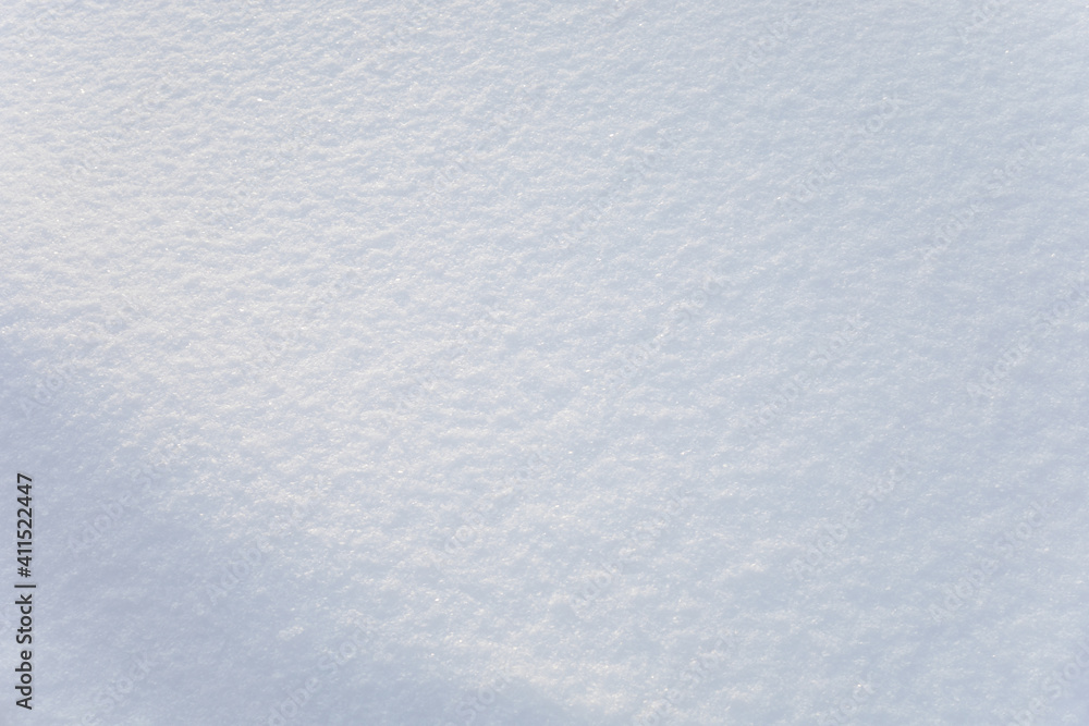 Background of fresh snow texture. Blue tone.