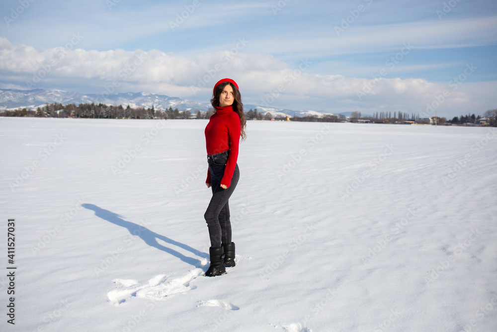 Portrait of A Woman in Snowy running in field