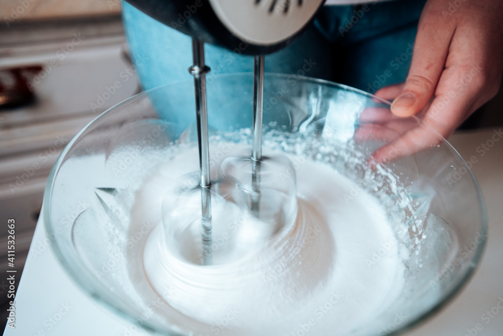 Fototapeta premium the mixer whips up the protein