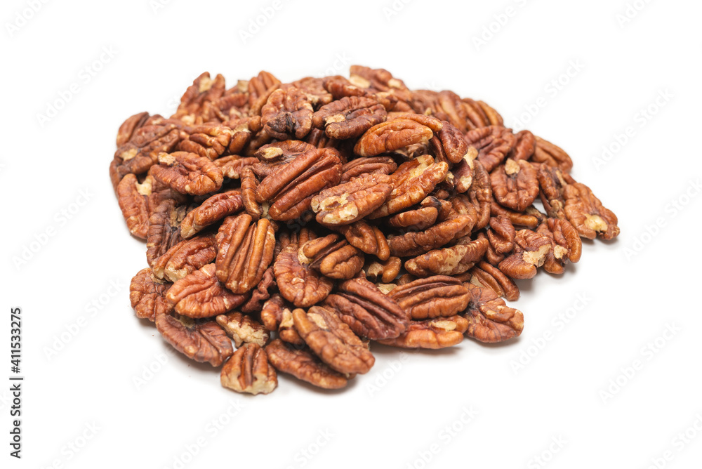 Pecan-nut isolated on white background. Top view. Pecan-nut isolated on white background. Top view.