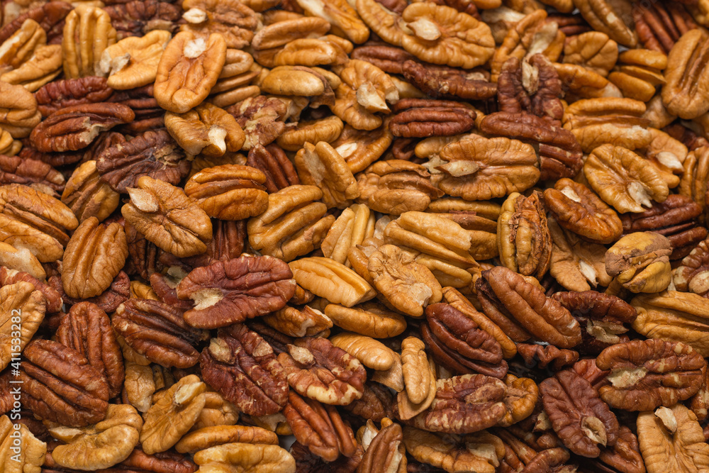 Tasty pecan-nut background. Top view. Tasty pecan-nut background. Top view.
