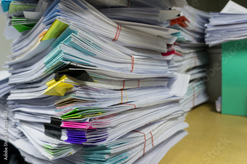 Fotografie Close up stack of document at office