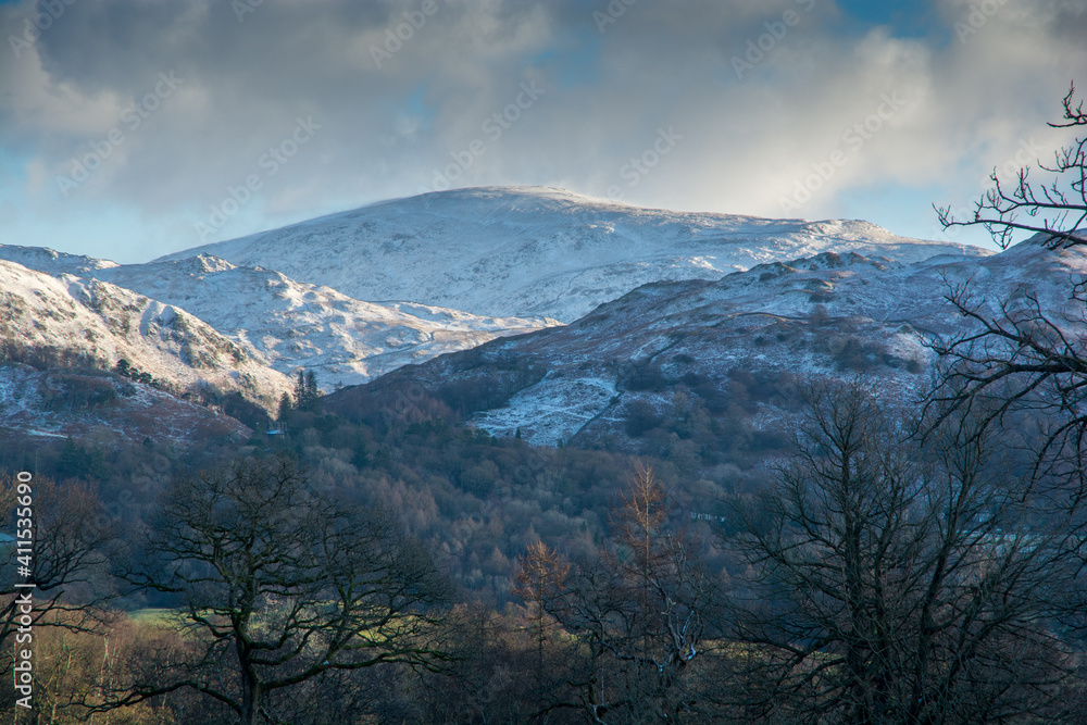 Snow covered fells of the Langdale Valley, Cumbria in winter sunshine