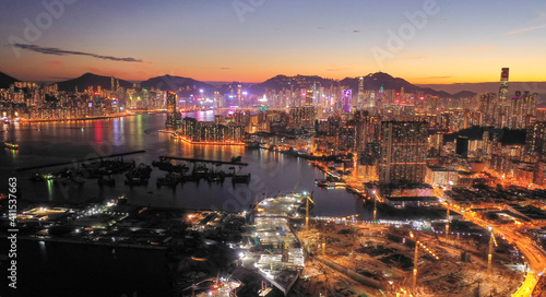 Photography Aerial view of the Kowloon and Hong Kong at sunset