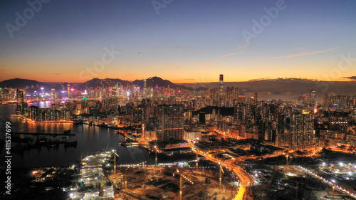 Photography Aerial view of the Kowloon and Hong Kong at sunset