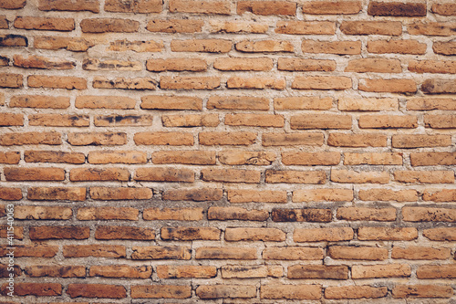 Old brown color brick wall for brickwork background and texture.