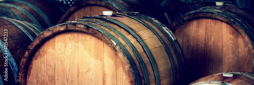 Photographie wine barrels in a cellar, detail of the bung
