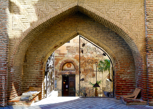 Georgia  Tbilisi  beautyful entrance of a church in the old city center.