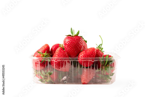 Strawberry In Plastic Container Isolated On White Background. Strawberries In Clear Punnet Closeup Front View. photo