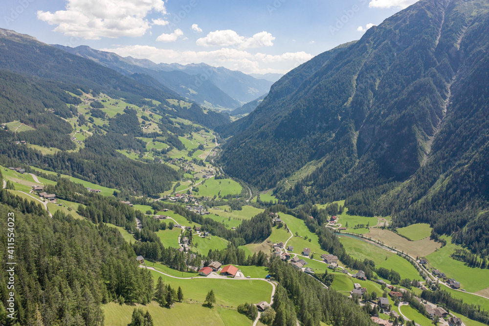 Aerial drone shot of Helligenblutt village in Grossglockner mountain valley in Austria