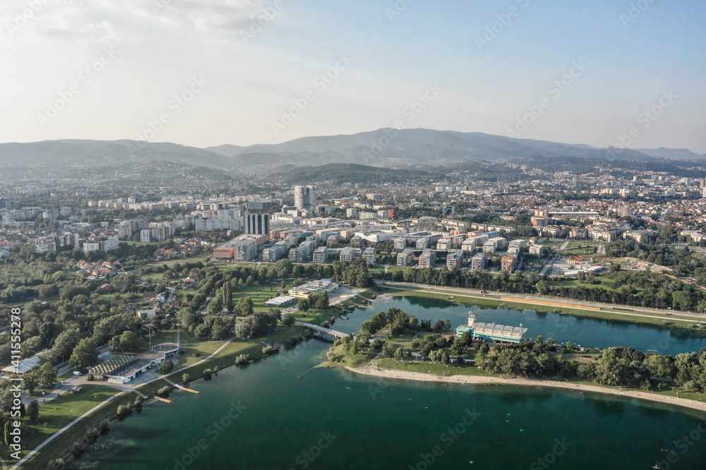 Naklejka premium Aerial drone shot of Jarun lake in southeast Zagreb in Croatia summer