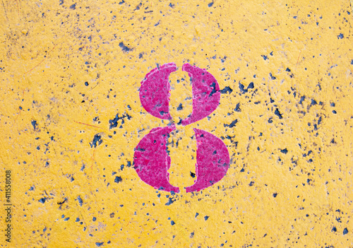 number 8 on a colored concrete floor