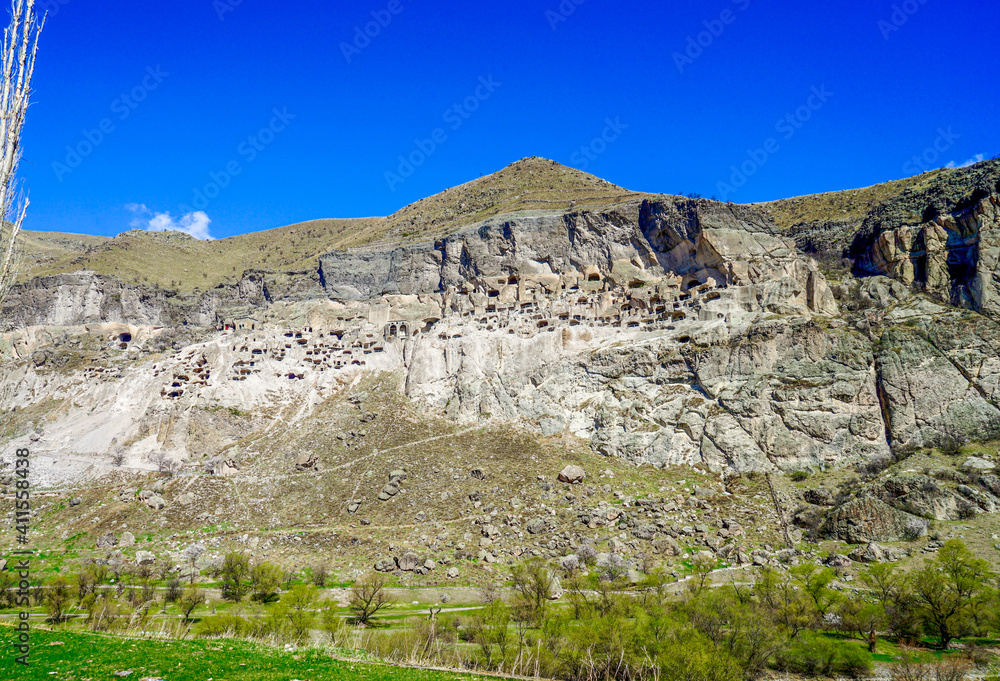 Georgia, The monumental cave city of Vardzia. Seen from outside down the valley.