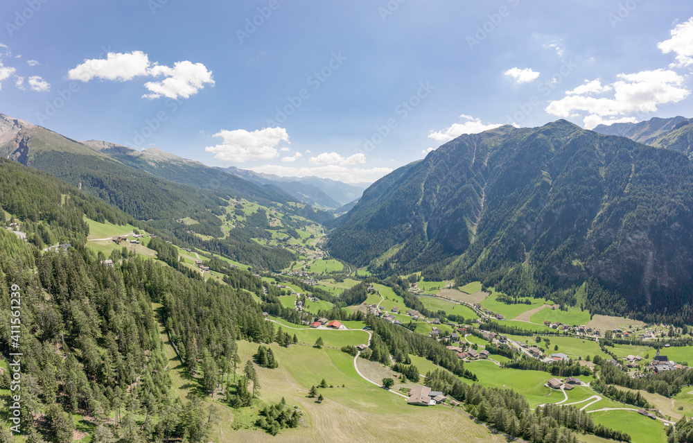 Aerial drone shot of Helligenblutt village in Grossglockner mountain valley in Austria