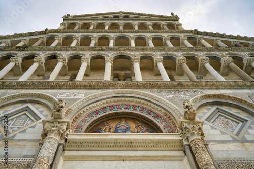 Facade of Pisa Cathedral with perspective from below in Piazza dei Miracoli Tuscany Italy
