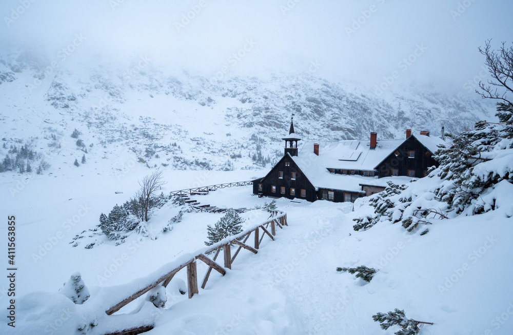 mountain shelter Samotnia in Karkonosze mountain during snowy winter in Poland