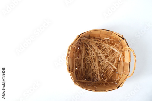 Wicker basket on a white background. Place for your text. 
