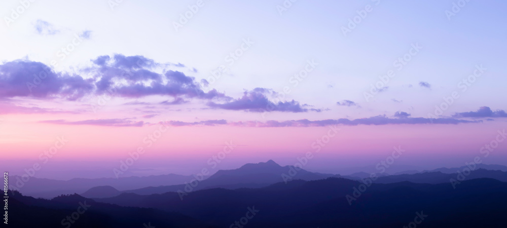 Beautiful Landscape twilight sky over the mountain ridges.