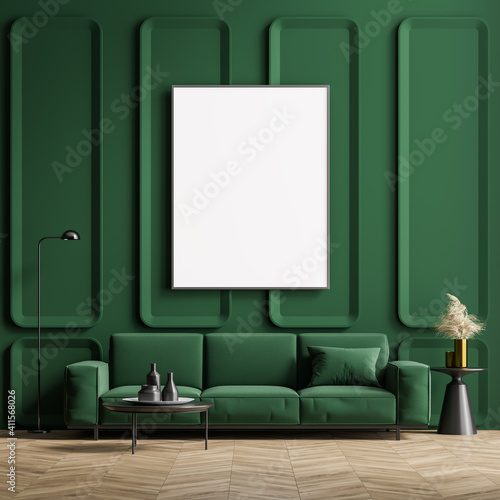 Mock up poster in the interior of the living room with a green wall and sofa. Wooden parquet.