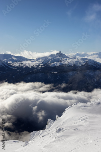 Beautiful Aerial View of Black Tusk and Canadian Nature Landscape covered in Snow during winter. Taken on top of Whistler Mountain, British Columbia, Canada. Nature Background