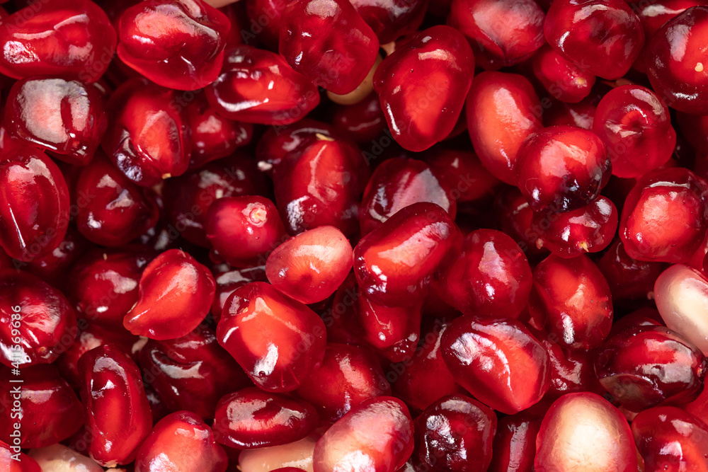close-up of pomegranate shelled fruit, concept of health and rich source of oxytocin for well-being close-up of pomegranate shelled fruit, concept of health and rich source of oxytocin for well-being