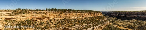 Panorama shot of canyon and ruins of historic rock towns in mesa verde national park in america