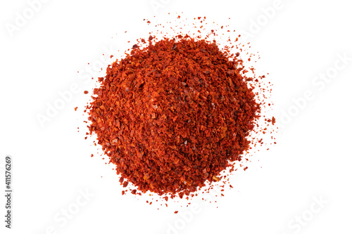 chilli pepper seedless flakes heap isolated on white background. Spices and food ingredients. in Korea known as Gochugaru. Used for Kimchi.