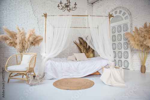 bamboo bed with white canopy