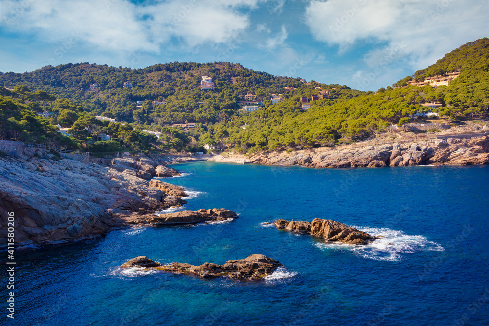 View of a small jetty of the Aiguafreda cove that is used by the diving school and the scholars of the seabed, since the cove has a spectacular seabed. Begur, Costa Brava, Catalonia, Spain