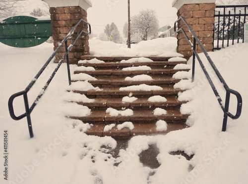 Falling Snow on Cement Park Steps photo