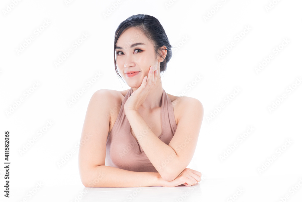 Beautiful Asian woman touching soft cheek smile with clean and fresh skin Happiness and cheerful. Teenager Asian woman Beautiful Asian woman touching soft cheek smile with clean and fresh skin Happiness and cheerful. Teenager Asian woman