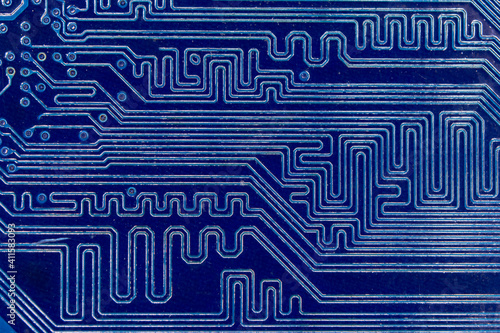 close up of blue electronics circuit board