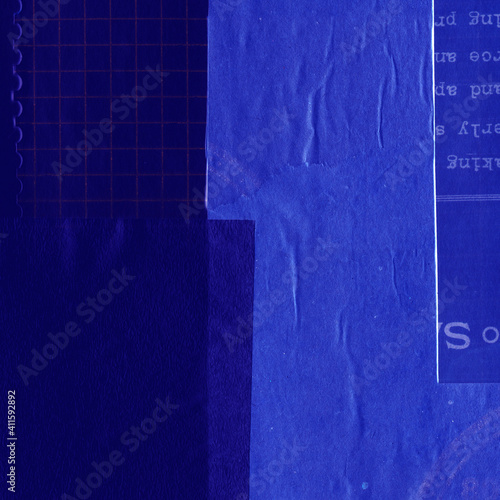 Blue and violet torn paper collage close-up. Texture made from various paper and cardboard parts. Damaged old paper background. Vintage blank wallpaper. Material design backdrop.