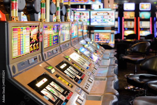 close up of row of slot machines