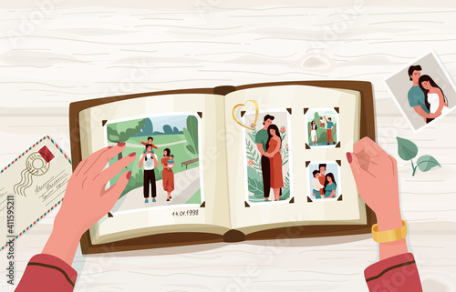 Photo album with family photographs, vector illustration in simple cartoon flat style with empty blank space at the top. Female hands holding open memorable book. View from above