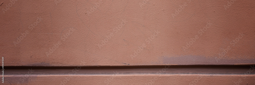 Fototapeta premium Decorative elements on the wall. Rough painted surface. Empty place for text, images and ads. Wide panoramic texture for background and design.