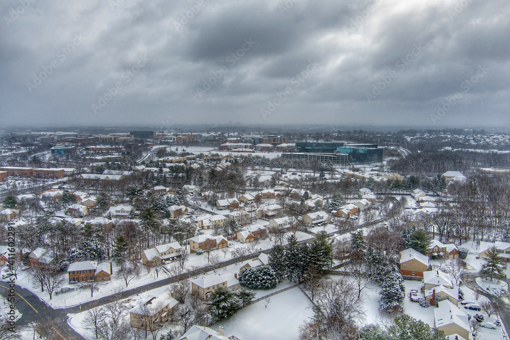 Aerial view of the Hunting Hills Woods neighborhood in Rockville, Montgomery County, Maryland, during a snowstorm.