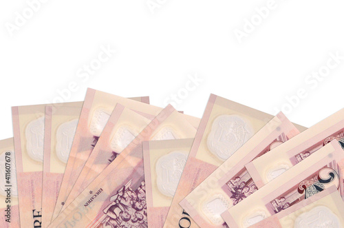 2 Singaporean dollars bills lies on bottom side of screen isolated on white background with copy space. Background banner template photo