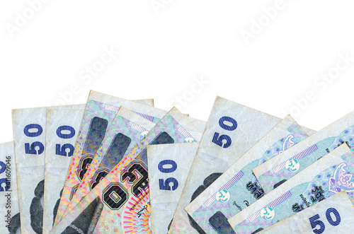 50 Thai Baht bills lies on bottom side of screen isolated on white background with copy space. Background banner template photo