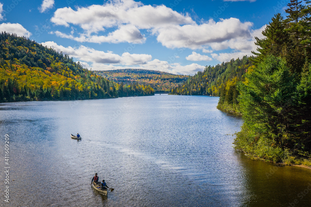 Fototapeta premium View on the Wapizagonke lake in Mauricie National Park (Quebec, Canada), on a beautiful fall day