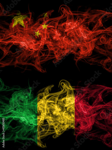 China  Chinese vs Mali smoky mystic flags placed side by side. Thick colored silky abstract smoke flags.