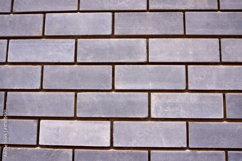 new gray brick wall. texture, pattern. close-up.