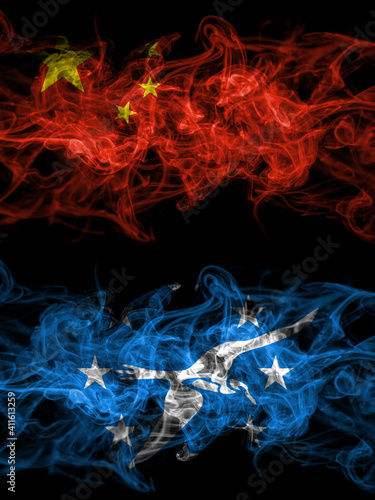 China, Chinese vs United States of America, America, US, USA, American, Corpus Christi, Texas smoky mystic flags placed side by side. Thick colored silky abstract smoke flags.