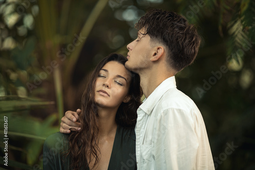 Romantic Couple in Love Standing in the Tropical Jungle